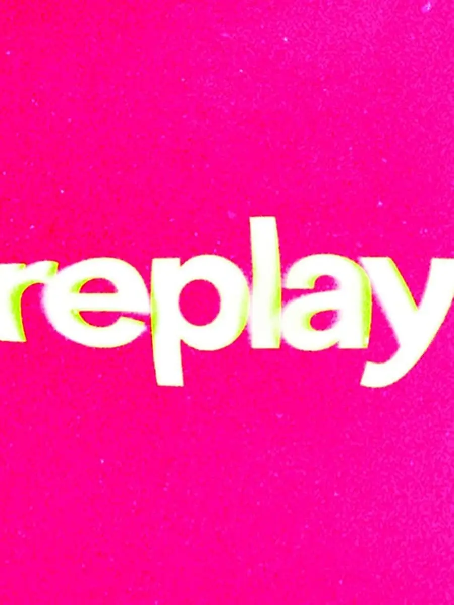 The word replay in white on a bright pink background