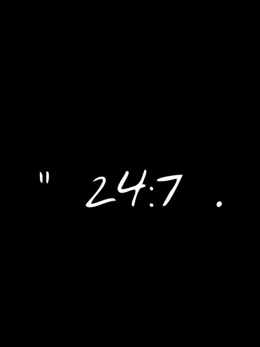 The numbers 24:7 handwritten in white on a black background